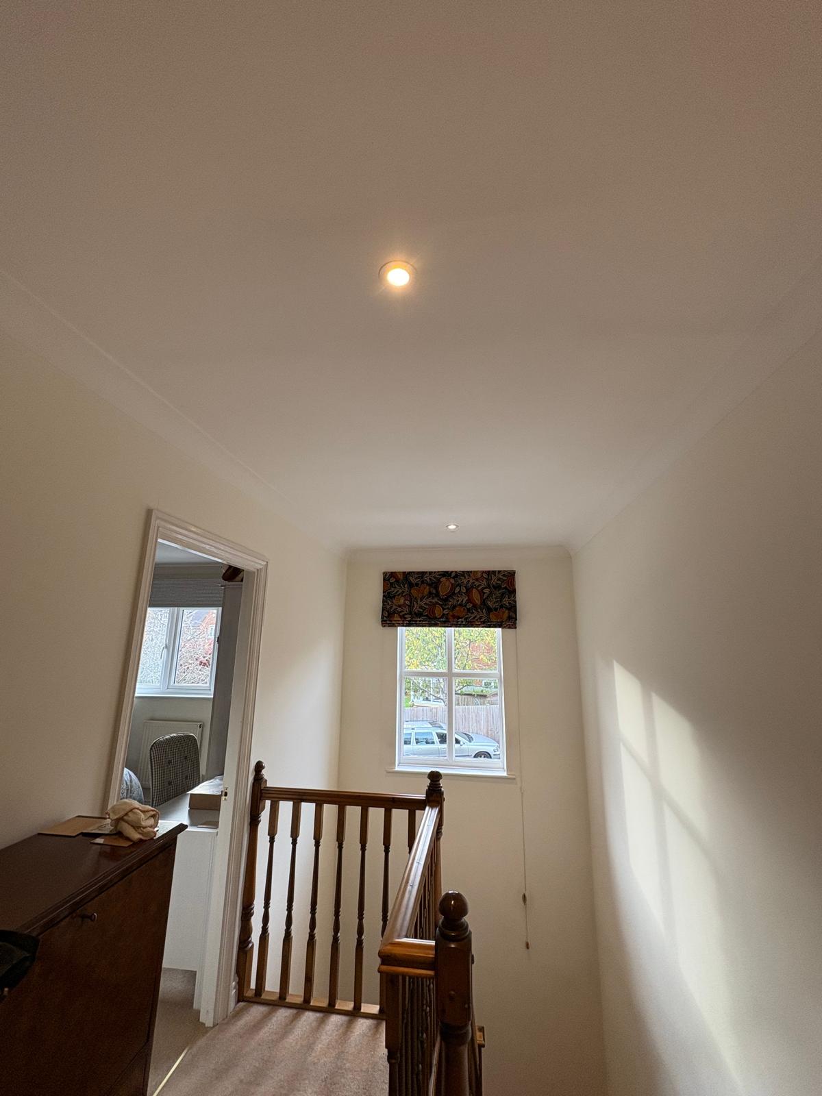 Landing with loft hatch and wall lights